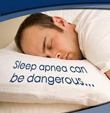 Man sleeping with face down on a pillow with the sign : Sleep Apnea Can Be Dangerous