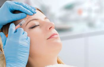 Woman Receiving Botox Injections from Her Dentist Alpharetta, GA