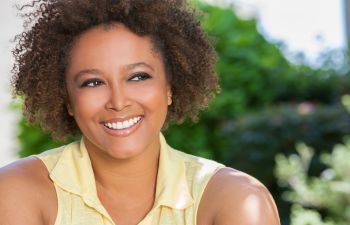 Happy woman with perfect smile after Dental Procedures Alpharetta GA