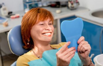 Woman Looking at Teeth